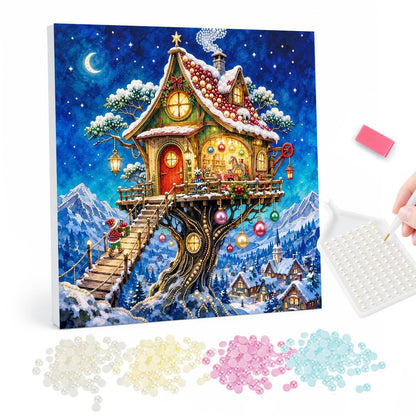 Lantern-Lit Winter Treehouse pearl painting – Glowing treehouse cottage with stairs and hanging ornaments in a snowy tree above a village at night