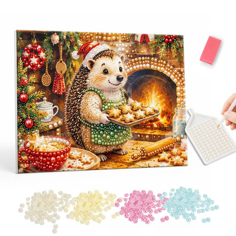 Hedgehog Baker by the Oven pearl painting – Hedgehog in a Santa hat and green apron holding a tray of cookies in front of a glowing brick oven