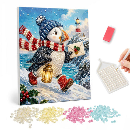 Puffin Delivering a Letter pearl painting – Puffin in a blue knit hat and striped scarf carrying a letter and lantern on a snowy shore by a lighthouse