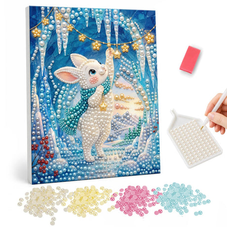 Bunny Under Starry Icicles pearl painting – White baby bunny in a snowy scene under hanging icicles and a garland of golden stars