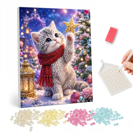 Grey Kitten Reaching for a Star pearl painting – Grey kitten in a red scarf reaching up to a gold star beside a Christmas tree and lantern at night