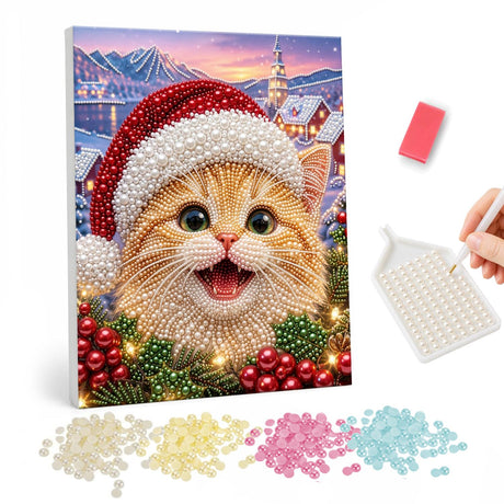 Beaming Ginger Kitten in Santa Hat pearl painting – Happy open-mouthed ginger kitten in a Santa hat among holly berries with a snowy village at sunset