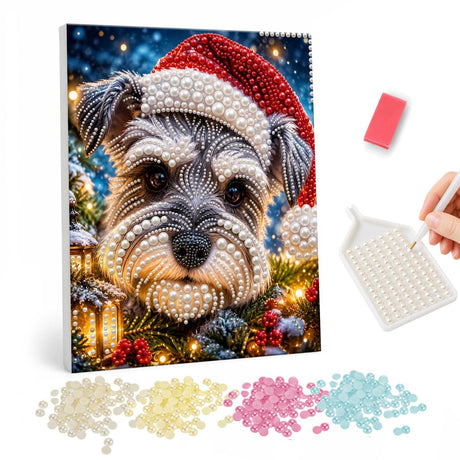 Schnauzer Pup in a Santa Hat pearl painting – Grey schnauzer puppy in a Santa hat against warm twinkling Christmas lights
