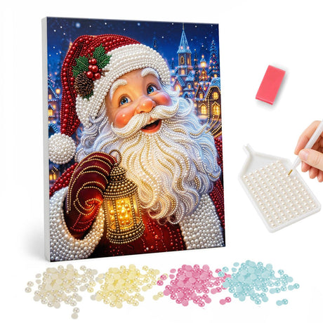 Lantern-Glow Santa in the Village pearl painting – Smiling Santa holding a glowing lantern in front of a snowy village at night