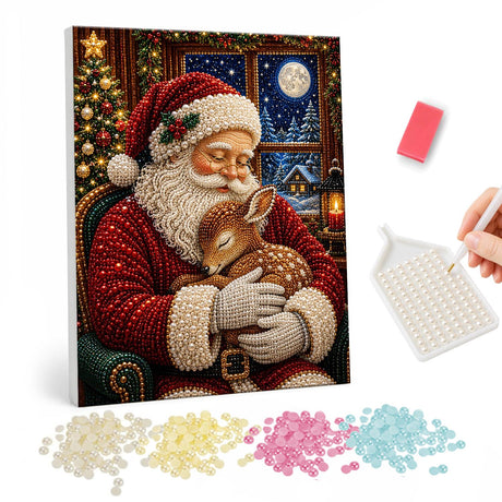 Santa Cradling a Sleeping Fawn pearl painting – Santa with closed eyes cradling a sleeping fawn in his armchair by a moonlit window