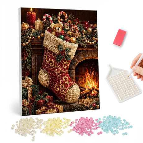 Teddy Peeking From a Red Stocking pearl painting – Red stocking with gold swirls holding a teddy and candy canes, hung by a glowing fireplace with gifts
