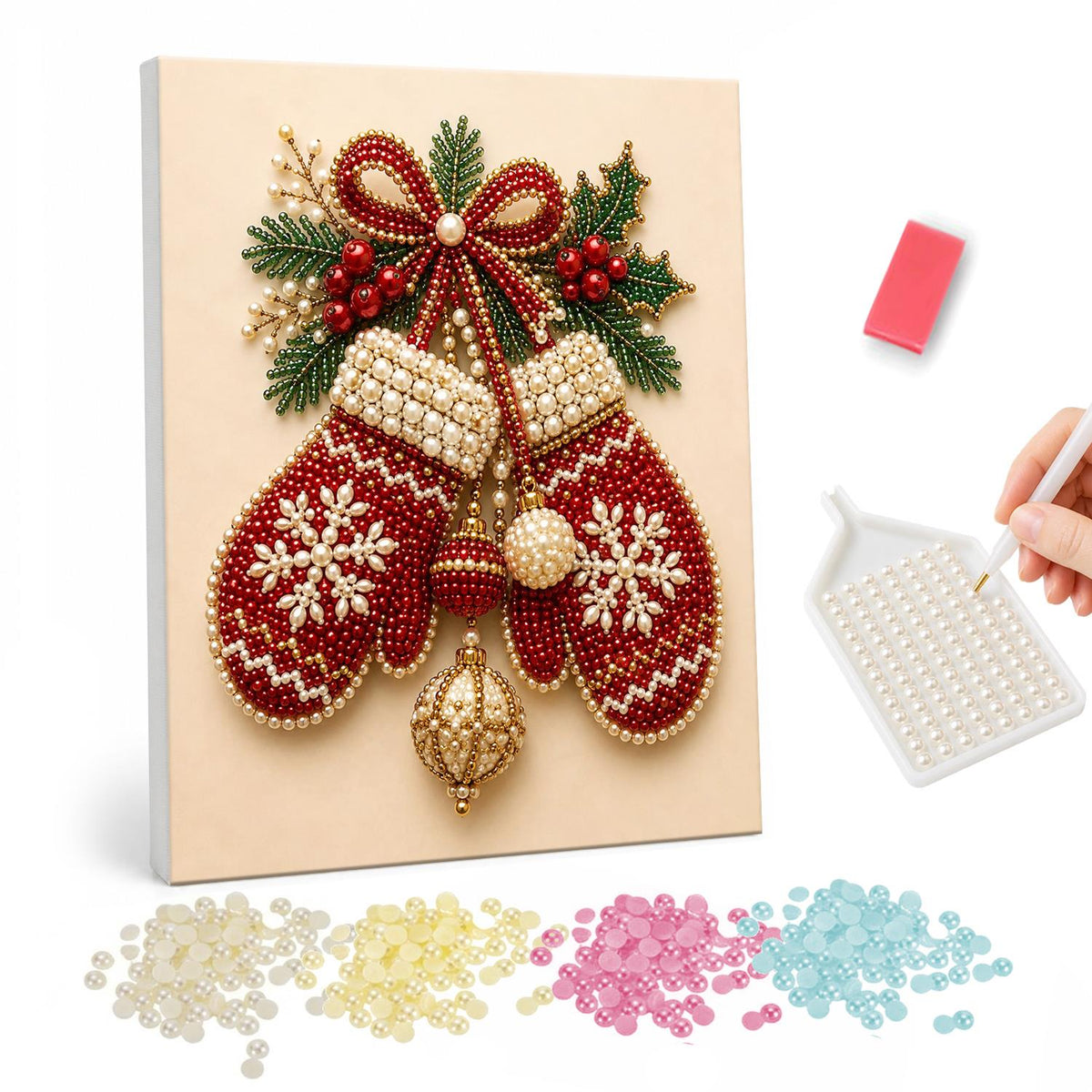 Snowflake Mittens on a Red Bow pearl painting – Pair of red snowflake-knit mittens hanging from a red bow with holly and a gold bauble
