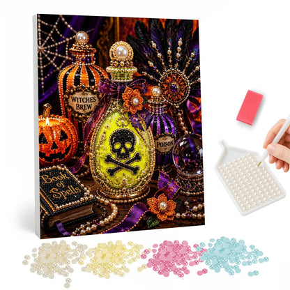 Skull Potion Bottle Still Life pearl painting – Glowing yellow potion bottle with a skull and crossbones beside a Witches Brew jar, spell book and jack-o'-lantern