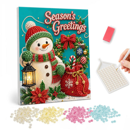 Lantern Snowman with a Gift Sack pearl painting – Snowman in a green knit hat with a lantern, wreath and gift sack under Season's Greetings lettering