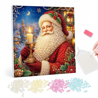 Santa's Candlelit Night pearl painting – Santa in a red coat holding a lit candle in a golden candlestick before a snowy village at night