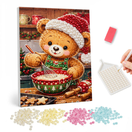 Teddy Bear Baking Cookies pearl painting – Teddy bear in a Santa hat and green apron whisking batter beside a tray of gingerbread cookies
