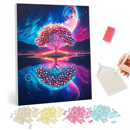 Ruby Tree Mirrored at Night pearl painting – Pink and red tree reflected in a glowing lake under a crescent moon and a blue starry sky