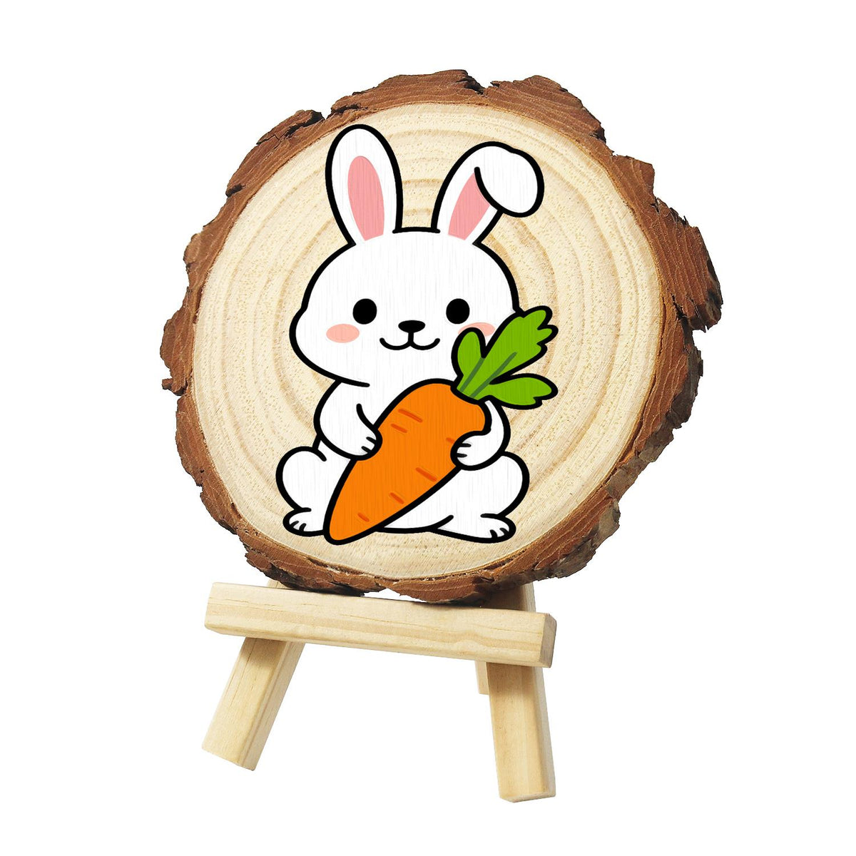 Bunny Hugging a Big Carrot paint by numbers wood slice – White bunny with pink ears and rosy cheeks hugging a large orange carrot with green leaves, painted on a pine slice on a small easel