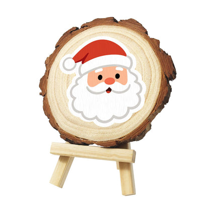 Rosy-Cheeked Santa Face paint by numbers wood slice – Smiling Santa face with rosy cheeks, a red hat and a big fluffy white beard, painted on a pine slice on a small easel