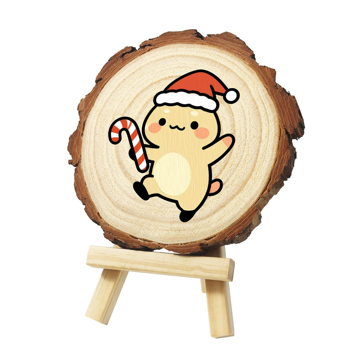 Skipping Cub with a Candy Cane paint by numbers wood slice – Cream bear cub in a Santa hat skipping along with one paw raised, holding a candy cane, painted on a pine slice on a small easel