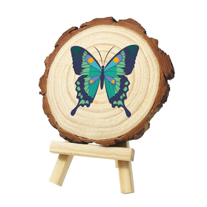 Emerald Swallowtail Butterfly paint by numbers wood slice – Teal and green swallowtail butterfly with navy wing edges, orange spots and long tails, painted on a pine slice on a small easel