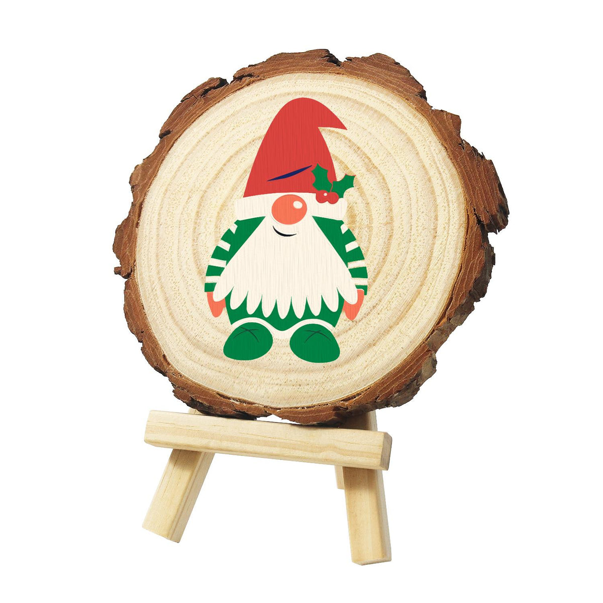 Holly-Hat Gnome in Green Stripes paint by numbers wood slice – Gnome in a red hat with a holly sprig, green and white striped outfit and green shoes, painted on a pine slice on a small easel