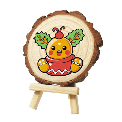 Holly Berry Gingerbread in a Cup paint by numbers wood slice – Golden gingerbread character with a red berry on top and holly leaves, sitting in a red iced cup, painted on a pine slice on a small easel