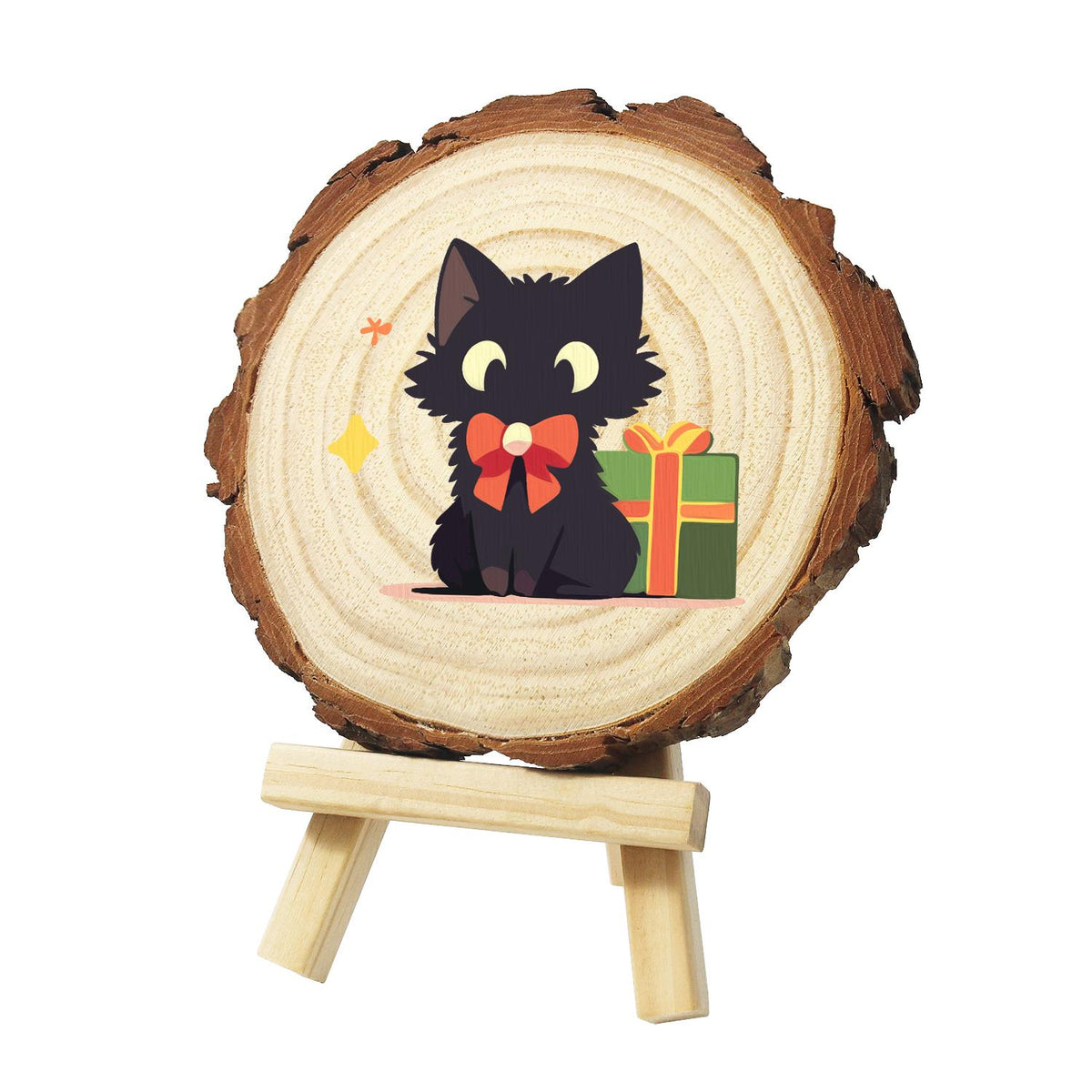 Black Cat with a Green Present paint by numbers wood slice – Fluffy black cat with yellow eyes and a red bow, sitting beside a green gift box with orange ribbon, painted on a pine slice on a small easel