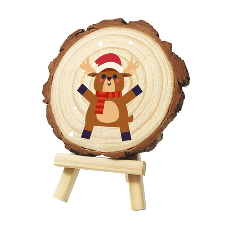 Cheering Reindeer in a Red Scarf paint by numbers wood slice – Brown reindeer in a red Santa hat and red striped scarf, standing with arms raised, painted on a pine slice on a small easel