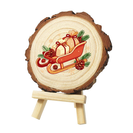 Red Sleigh Piled with Gifts paint by numbers wood slice – Red sleigh loaded with wrapped gifts and sacks, trimmed with evergreen sprigs, cones and red berries, painted on a pine slice on a small easel